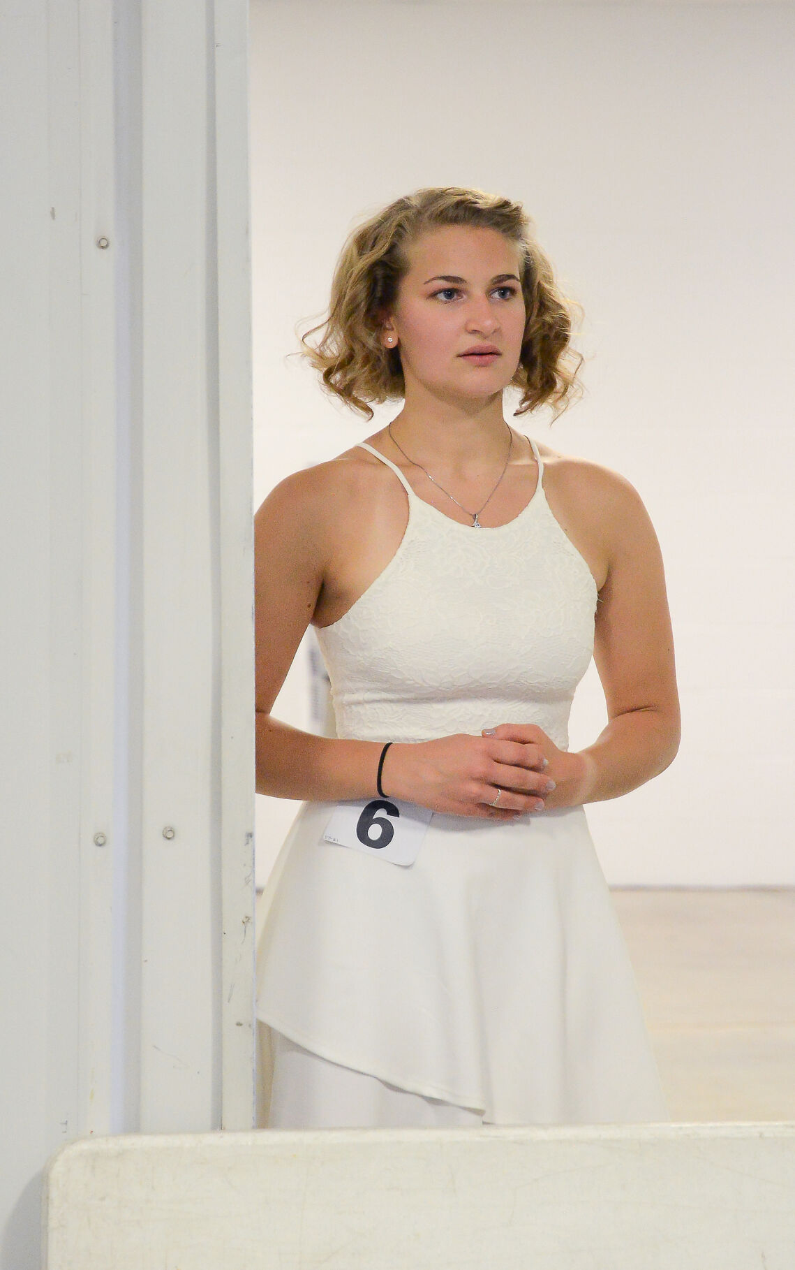 Cathrine Mayhan watches the younger contestants